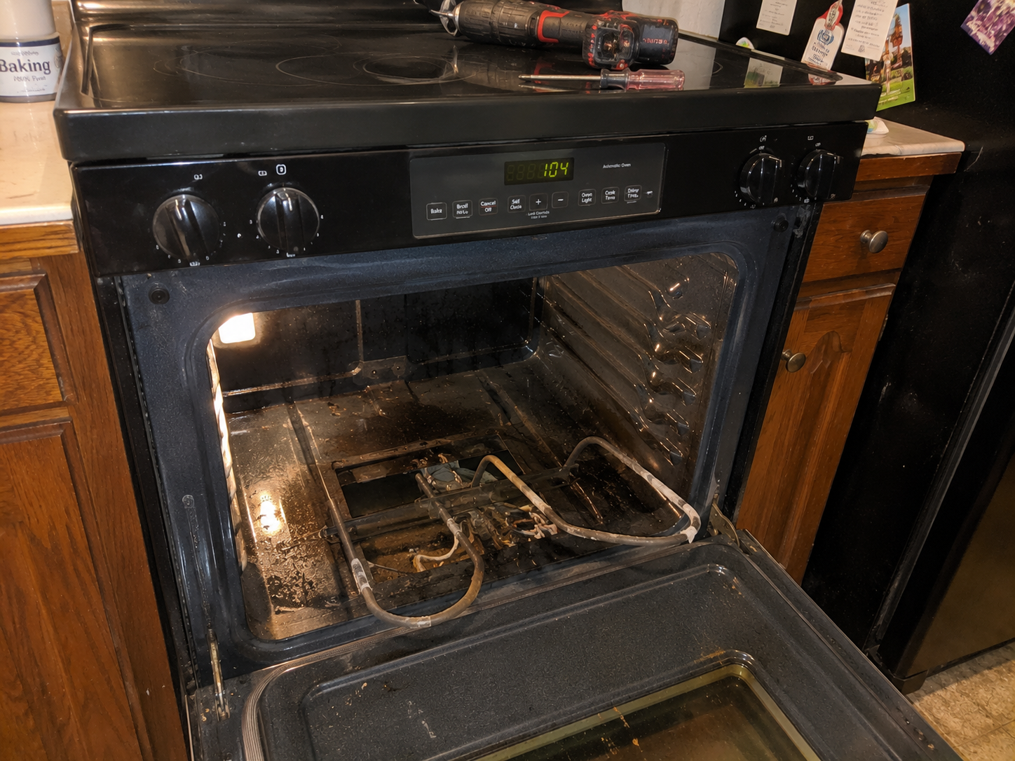 replacing a broken bake element inside a GE electric oven